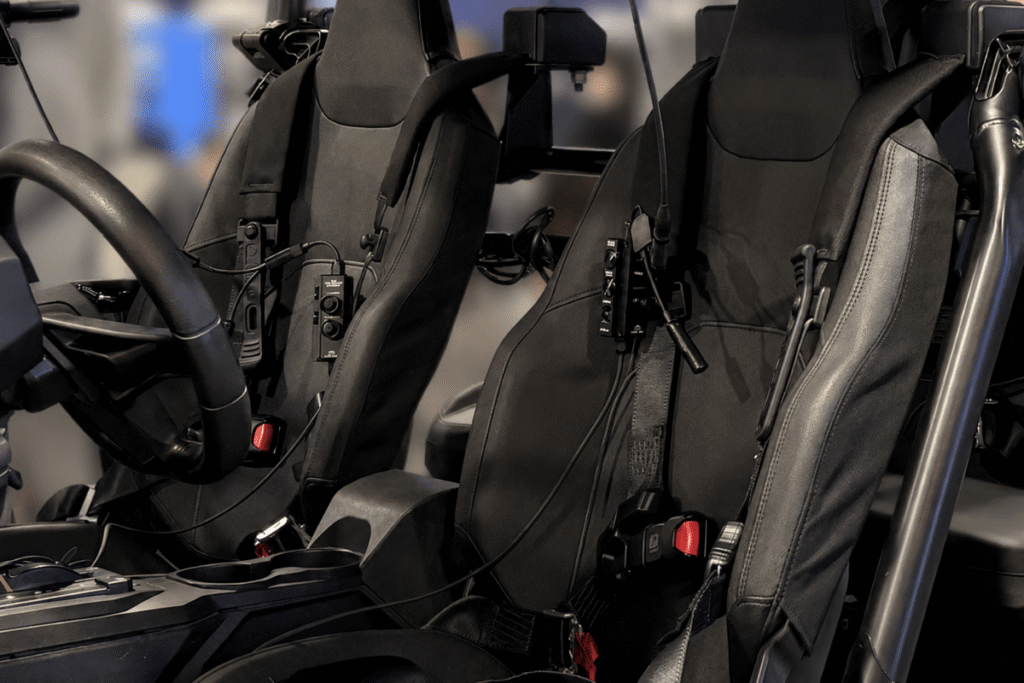 C-AT COMFORCE vehicle intercom system with seat-mounted ICU crew controllers inside a tactical vehicle