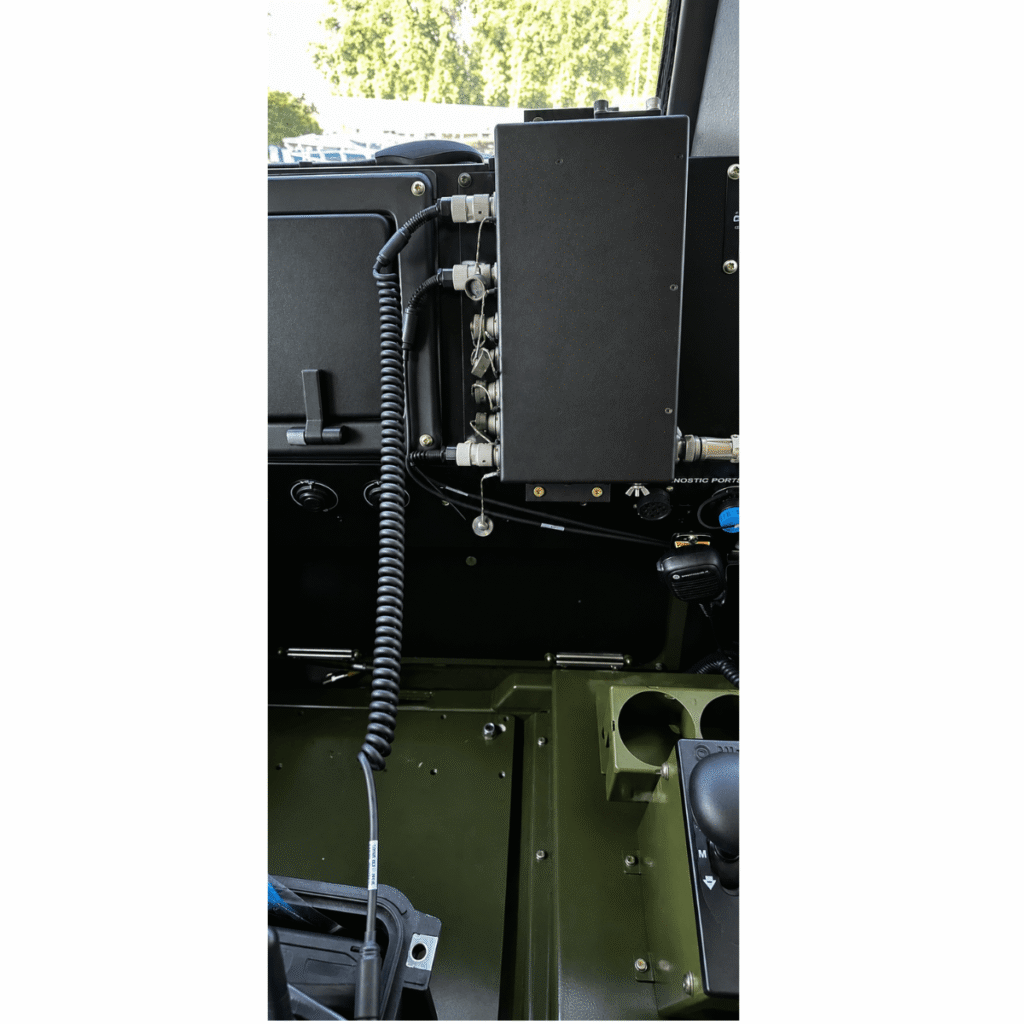 C-AT ComForce Intercom Master Unit (IMU) installed in a tactical vehicle, providing crew communications and radio integration for mission-critical operations.