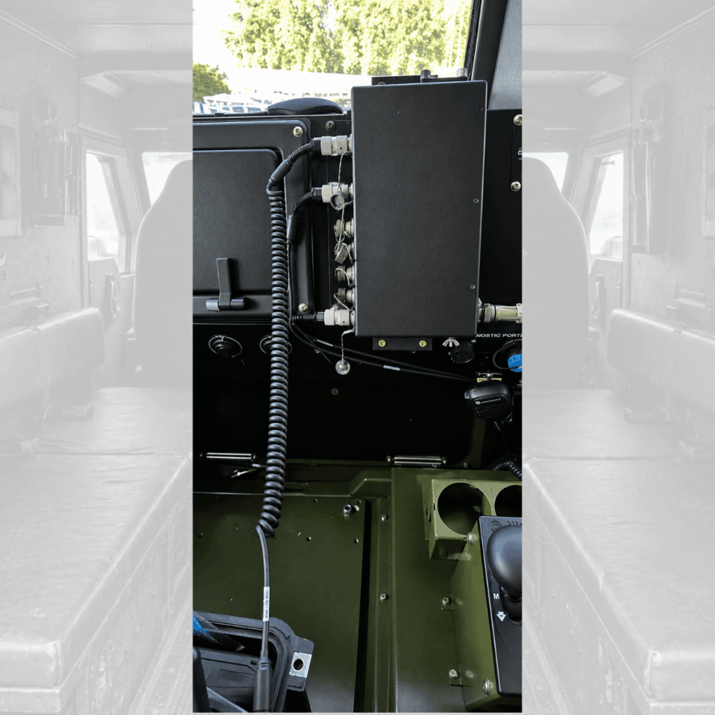 C-AT ComForce Intercom Master Unit (IMU) installed in a tactical vehicle, providing crew communications and radio integration for mission-critical operations.